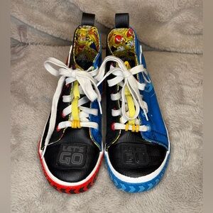 Colorful Kids High-Top Sneakers featuring Sonic and Shadow the hedgehogs .